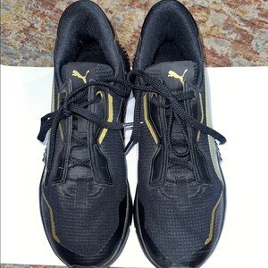 Puma Black and Gold Athletic Shoes with Mesh Design